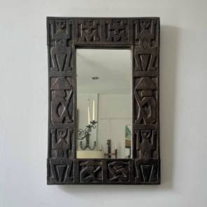 A Hand Carved African Mirror
